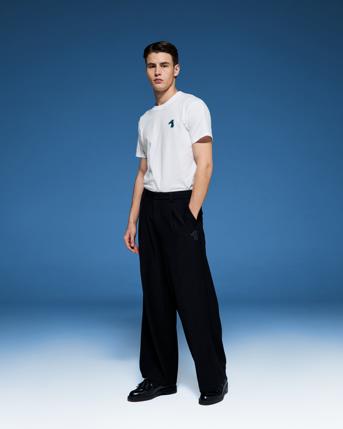 SMILEYHOUND PLEATED TROUSERS