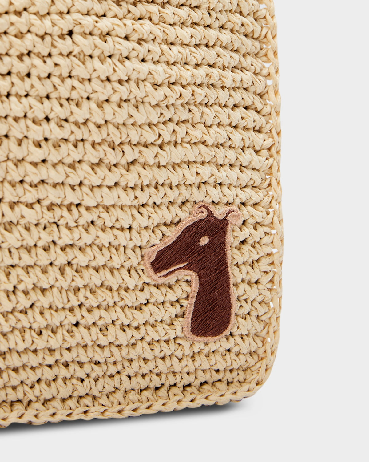 SMILEYHOUND PAPER RAFFIA CROSSBODY BAG