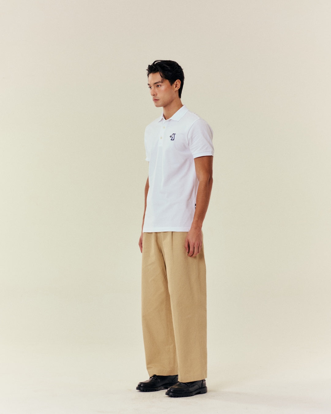 SMILEYHOUND SOLID RIBBED RIBBON LOGO POLO SHIRT