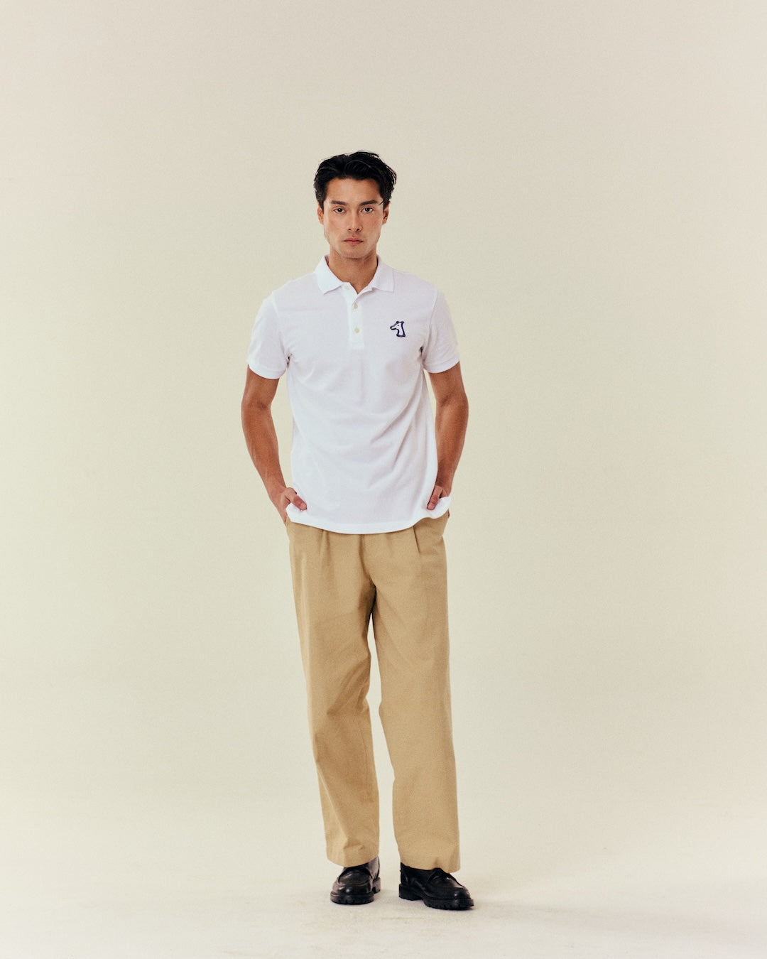 SMILEYHOUND SOLID RIBBED RIBBON LOGO POLO SHIRT