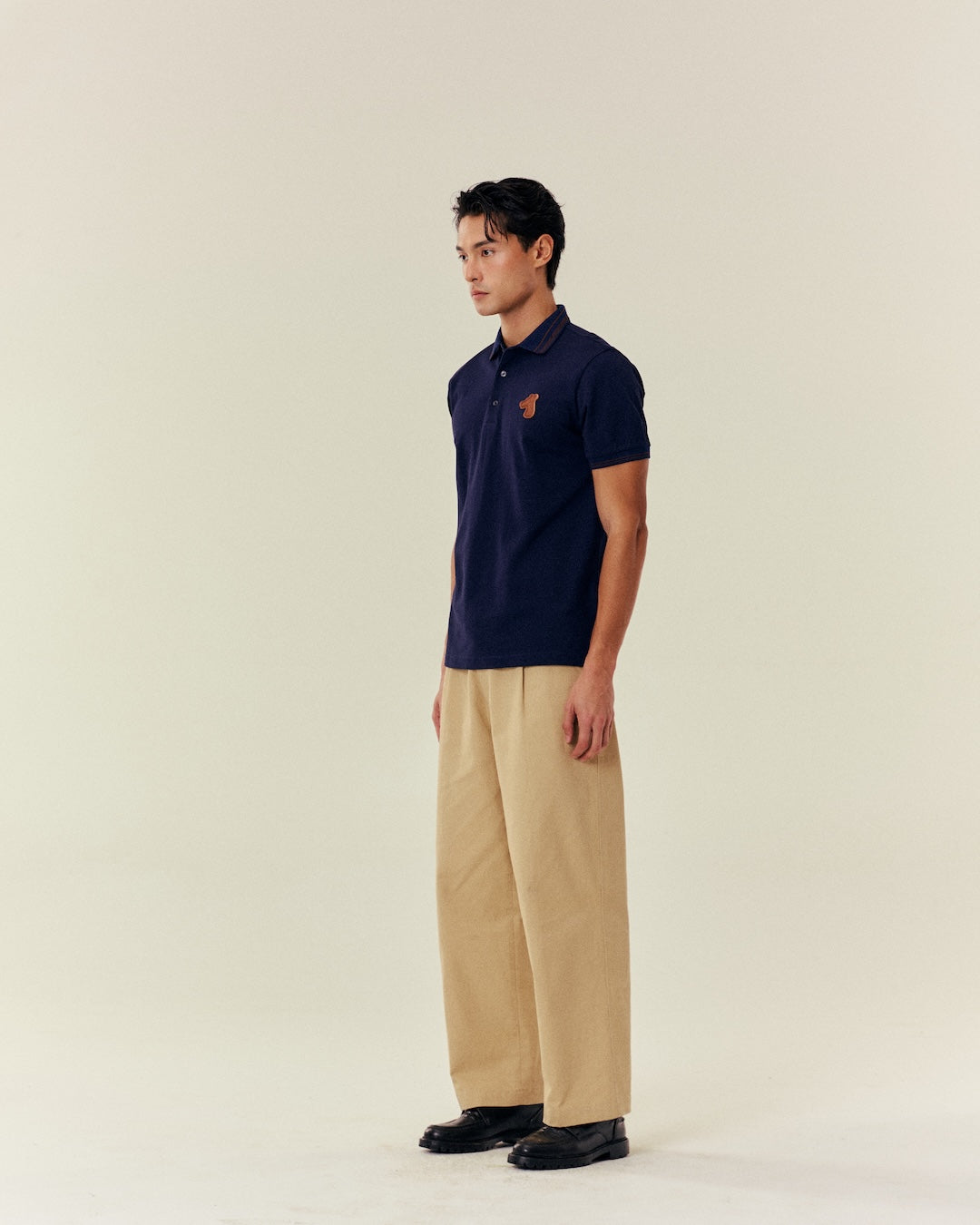 SMILEYHOUND STRIPED RIB COLLAR POLO WITH LEATHER PATCH