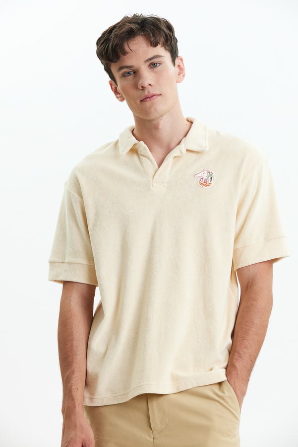 เสื้อโปโลผ้าเทอร์รี่ปักโลโก้